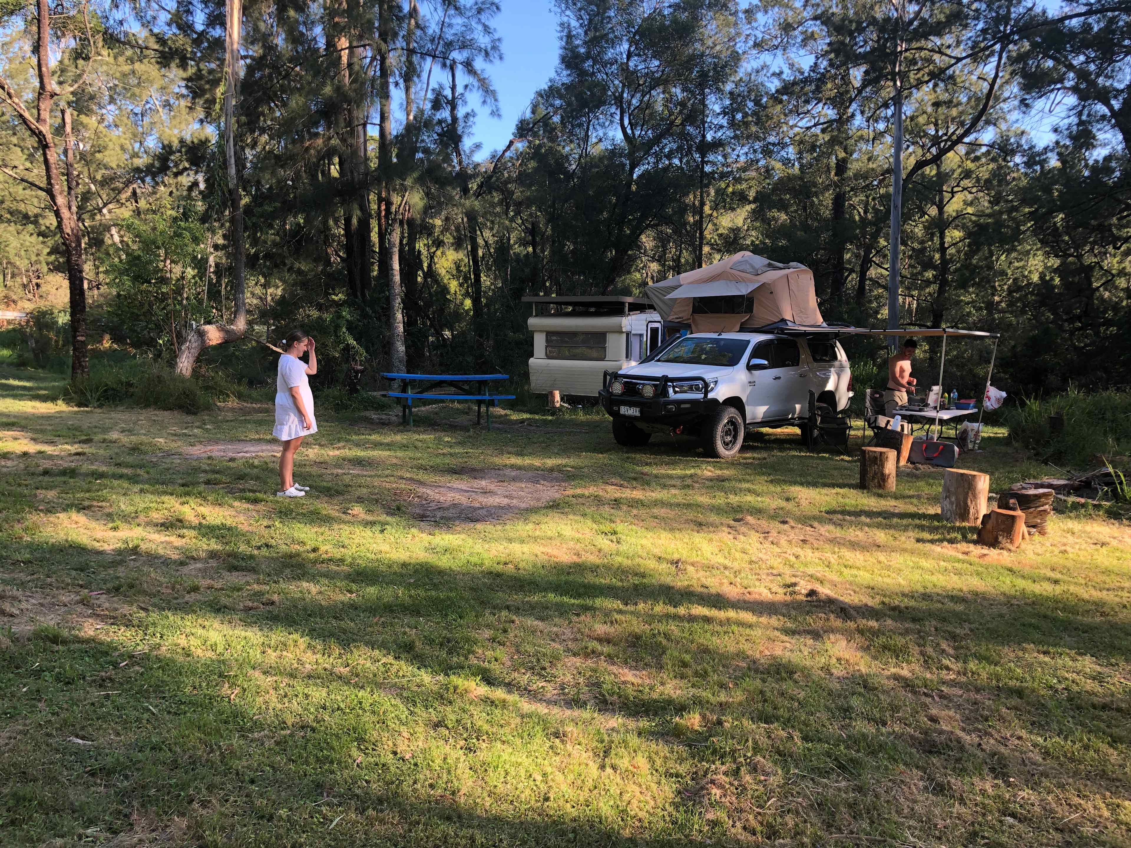Big secluded space with a winter fire pit, picnic table and summer shade. 