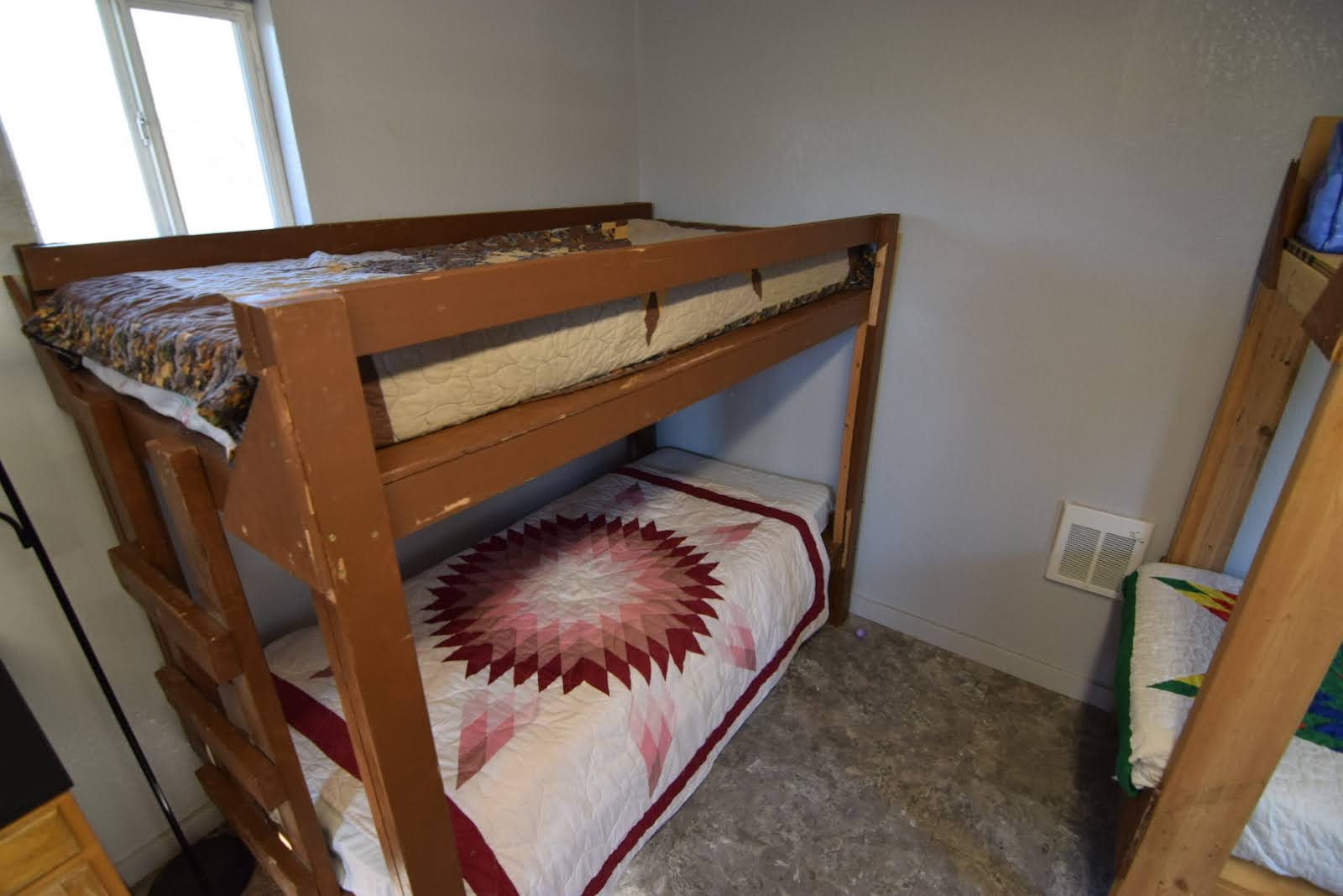 Both sides of our bunkhouse are equipped with 8 beds, A/C & Heater, and extra bedding