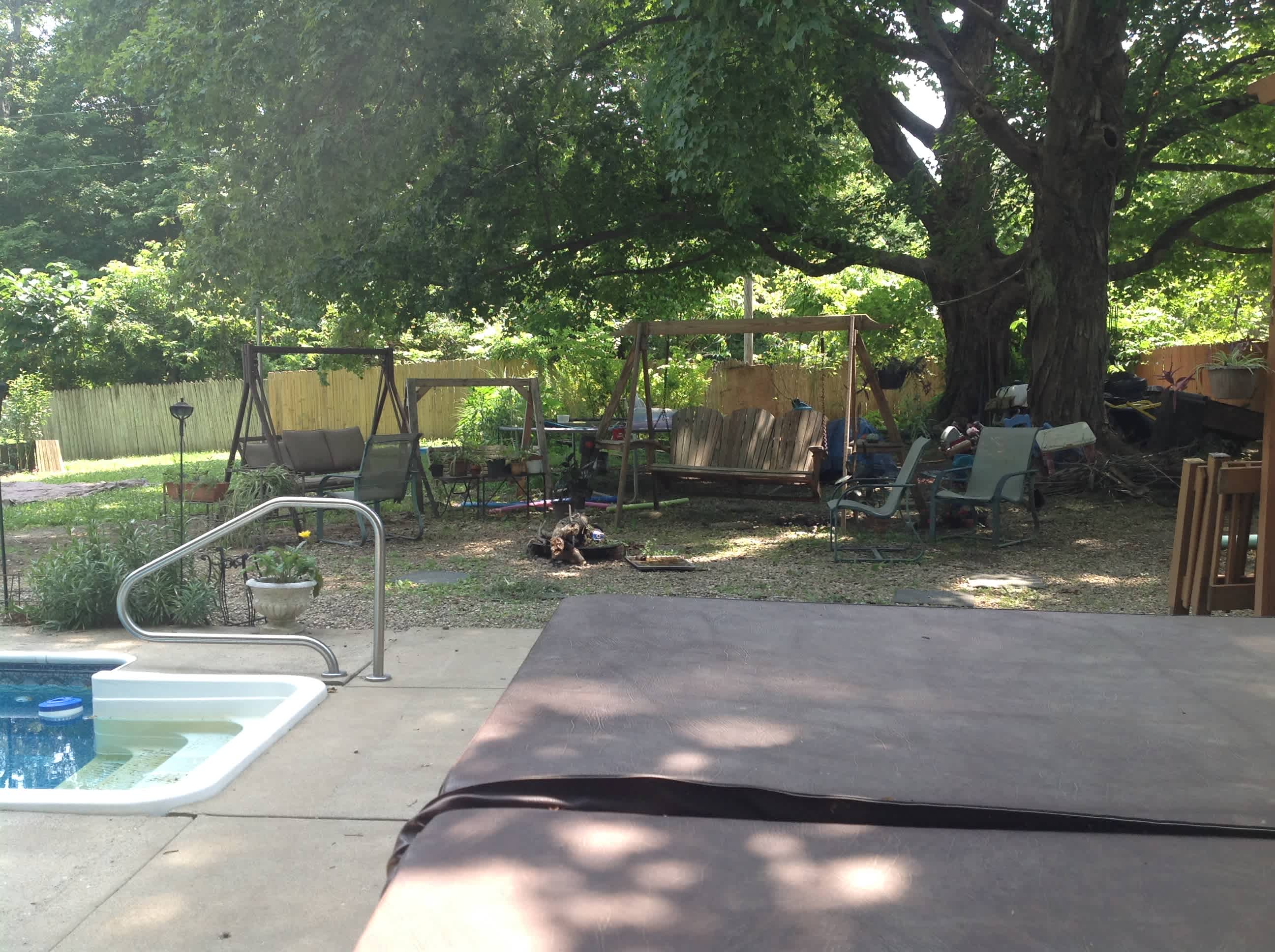 Toasty bonfire area with swings and seating.