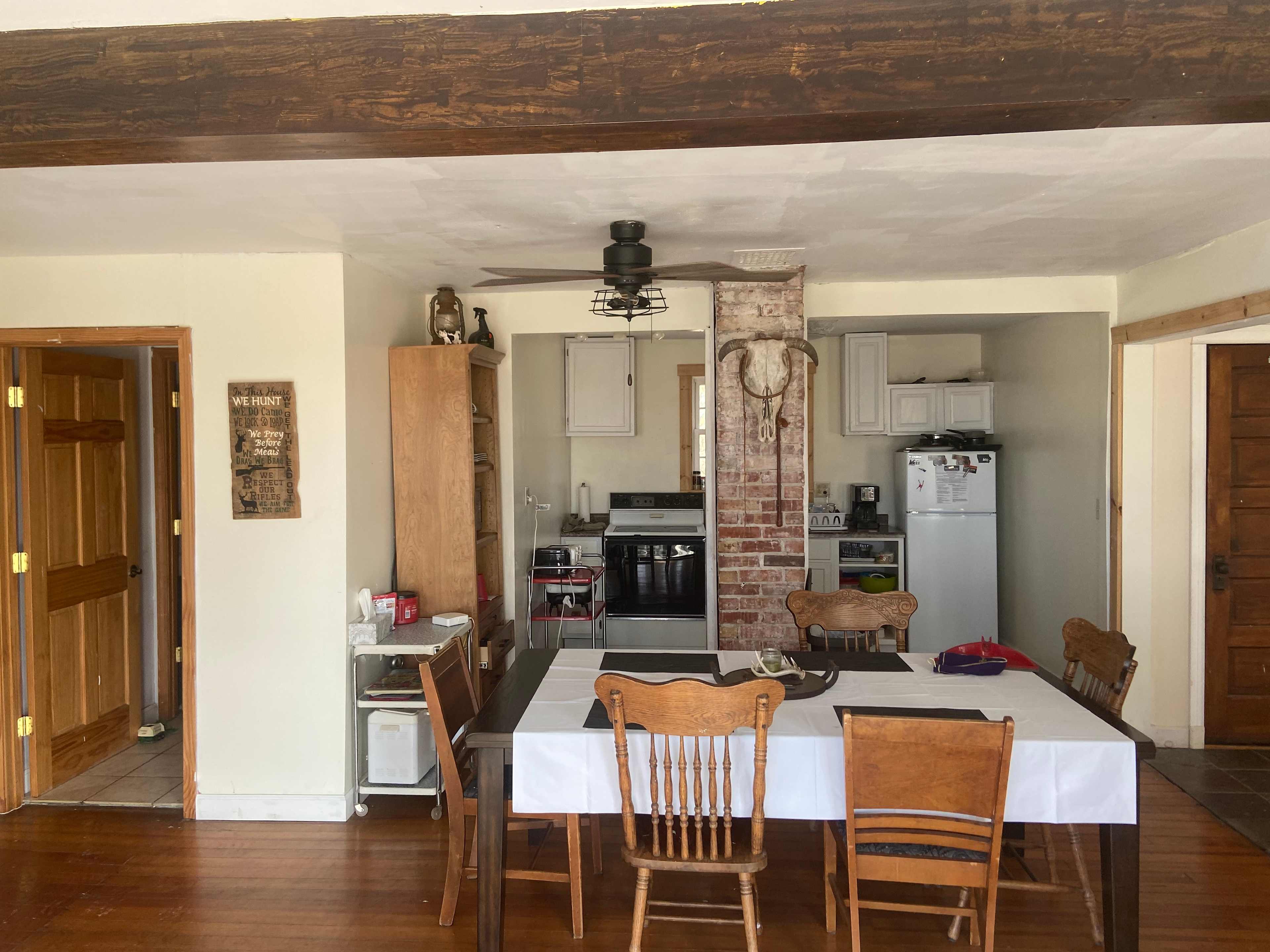 Coming in from front door.  Dining room and kitchen.