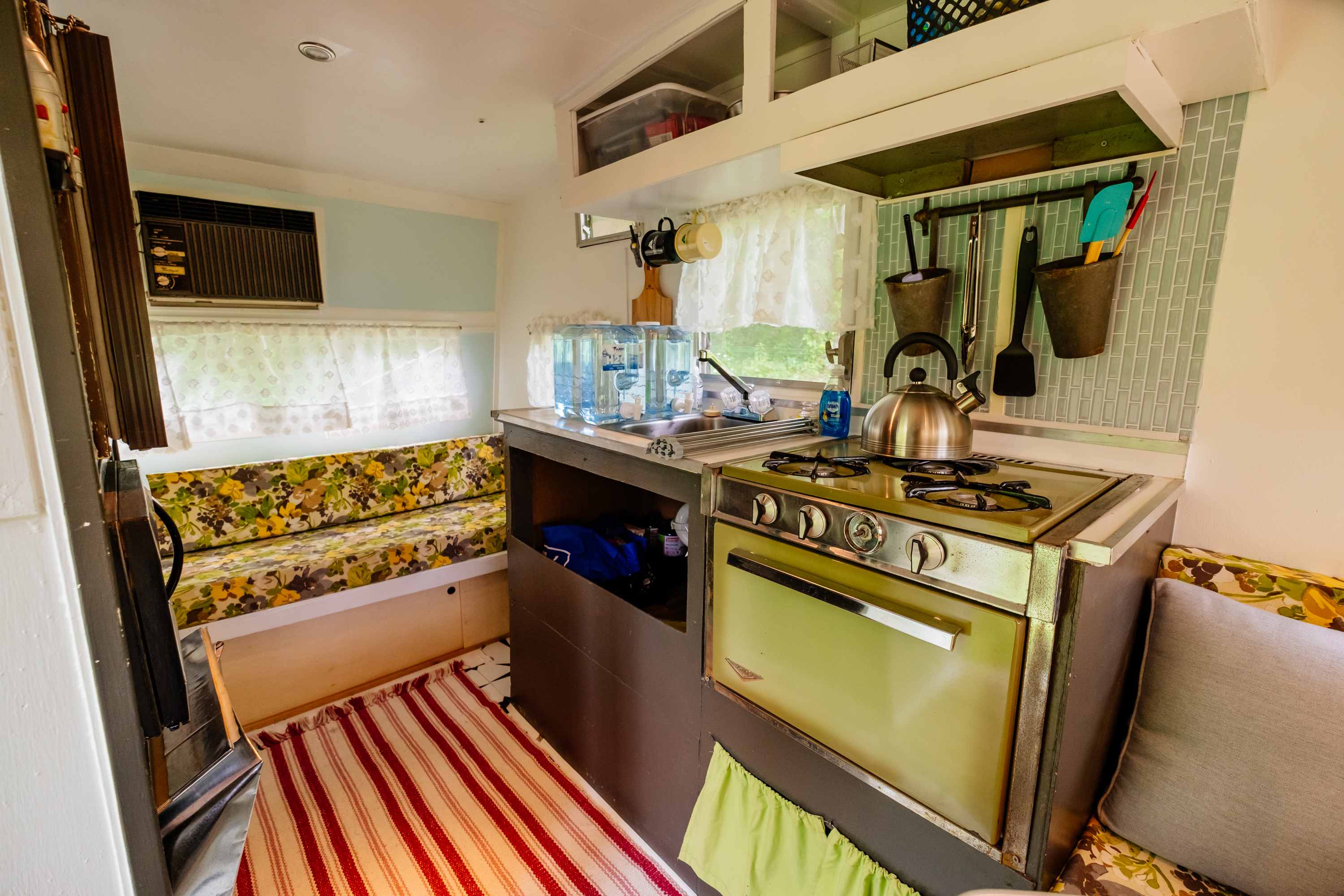Kitchen and couch/sleeping area
