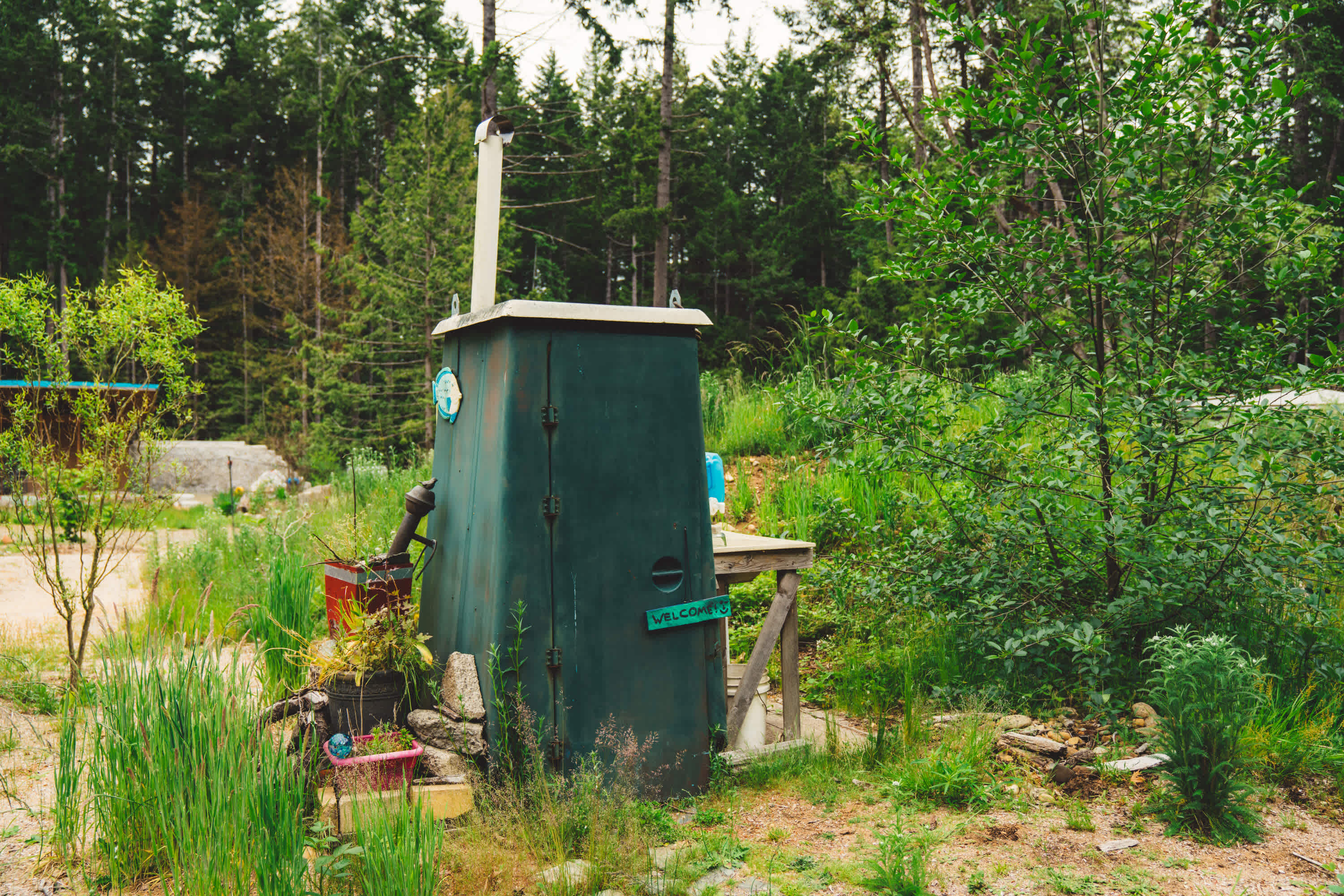 The pit toilet. 