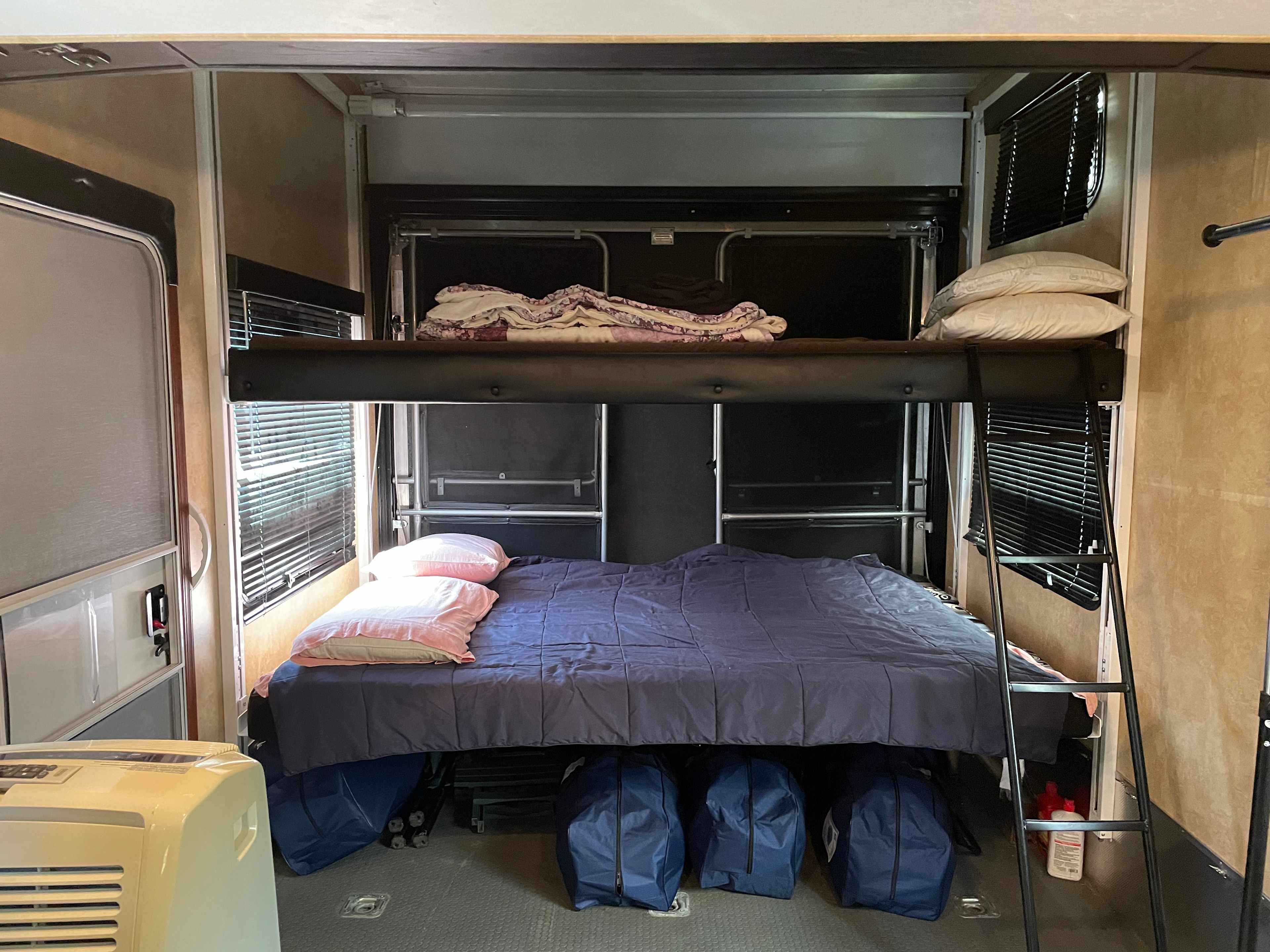Two queen size beds in separate area 