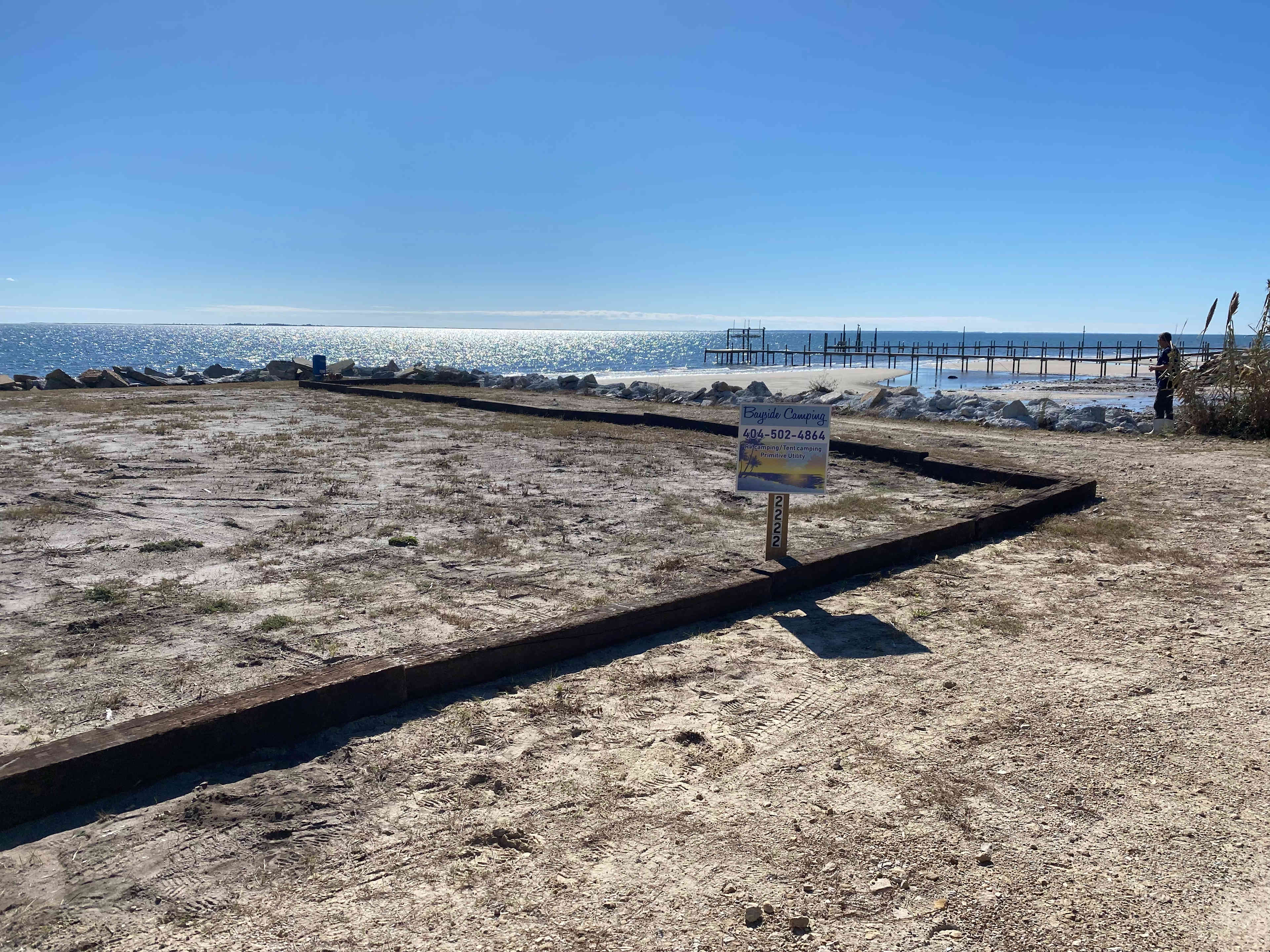 Back-in only; no pull around on Florida road base camping pad 16’ x 50’.  There is only 1 site; entire area included for use.  No shared space.