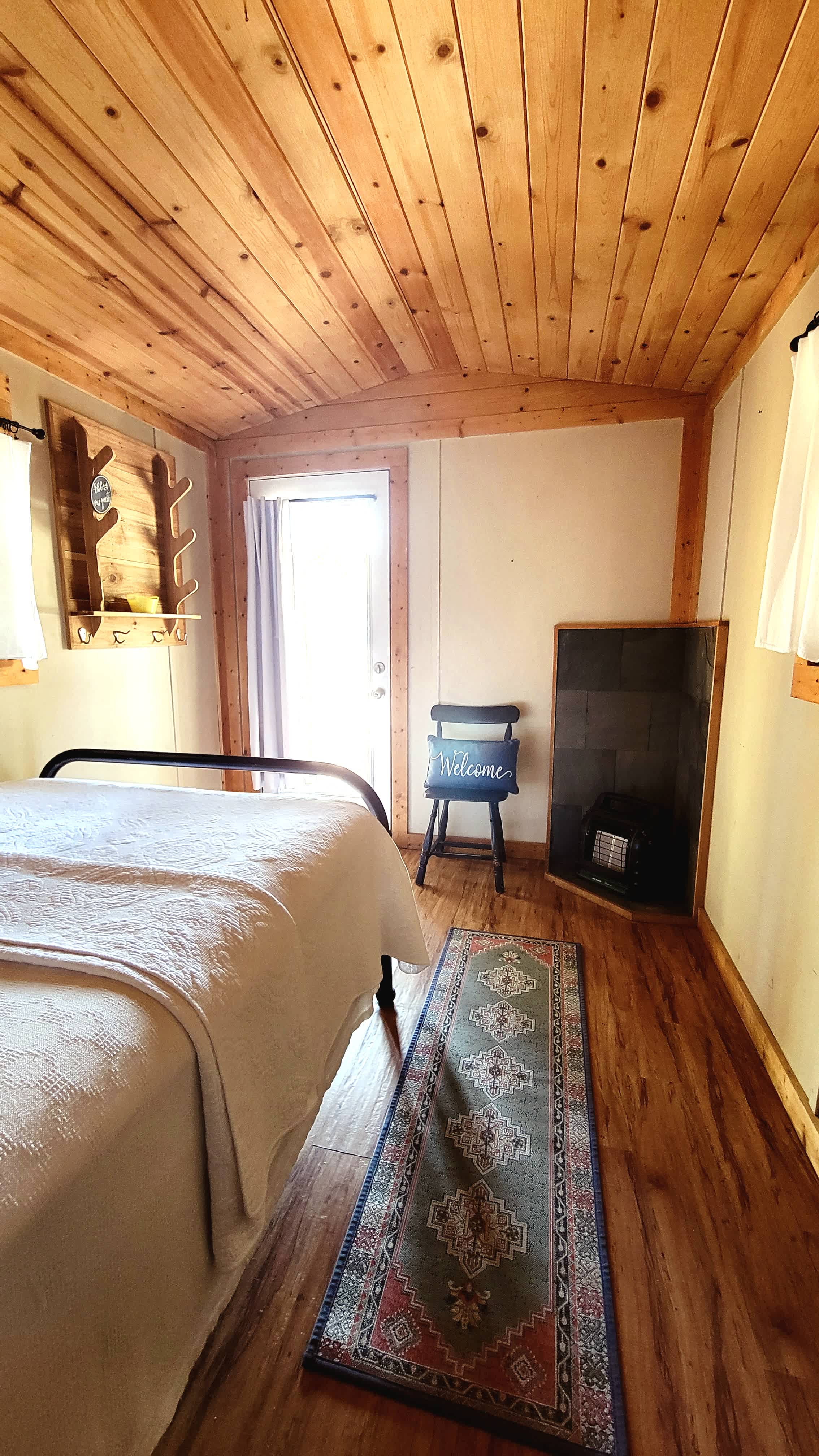 Cabin interior. One full size bed. 