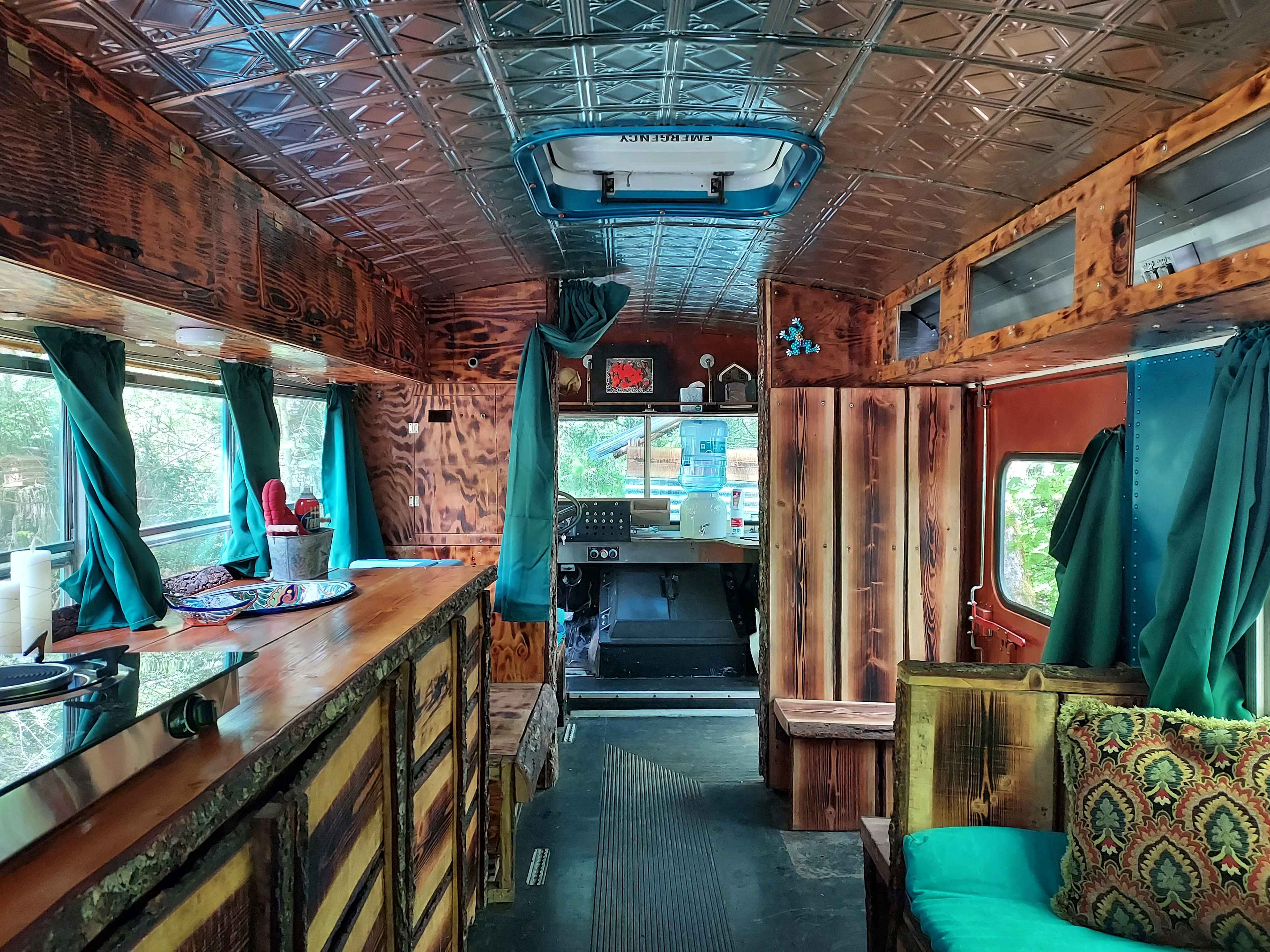 You'll notice we have most everything you'll need to cook a meal right here in the bus. We have spices, cooking oils, drinking water, and much more.