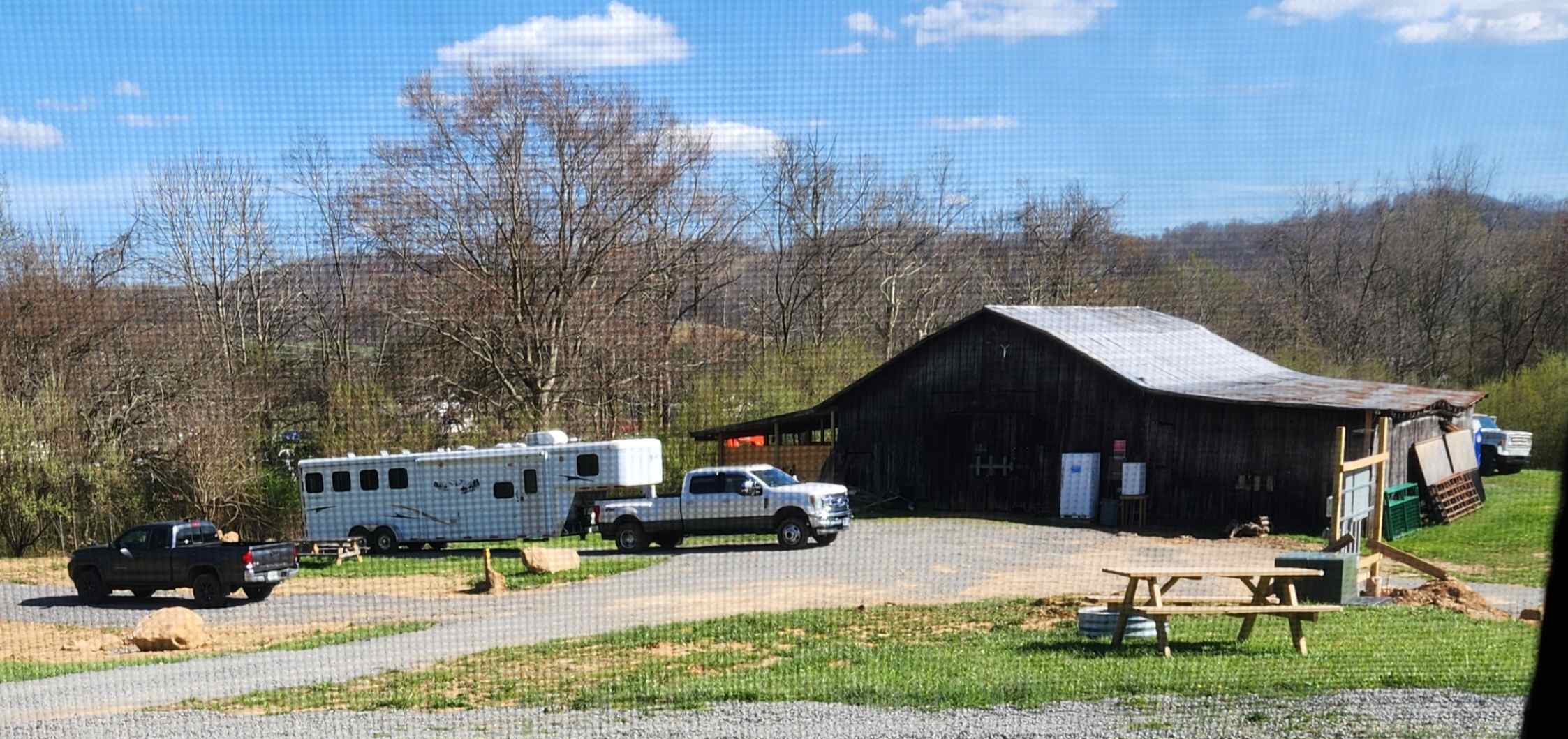 Barn with additional campers with horses.