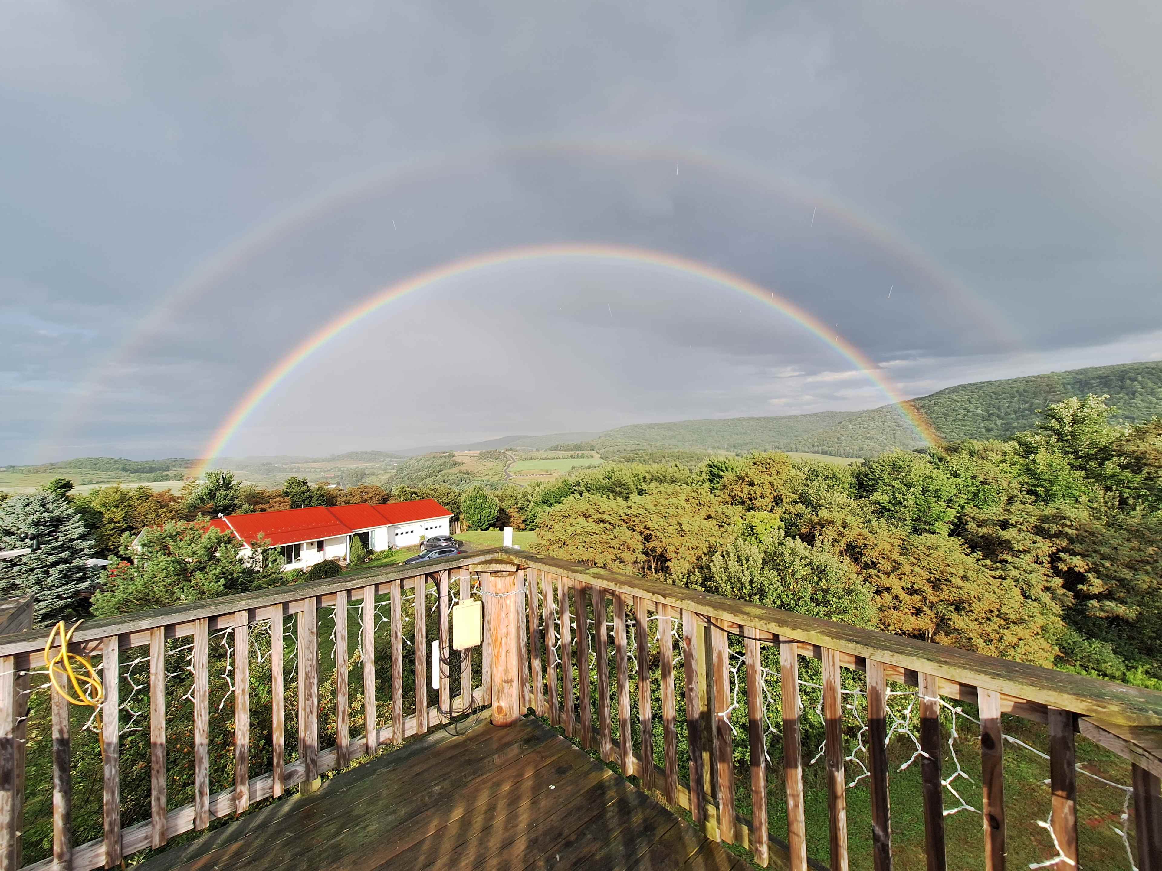 Watching the sunrise or sunset... or catching a magical rainbow like this is why I love my property!