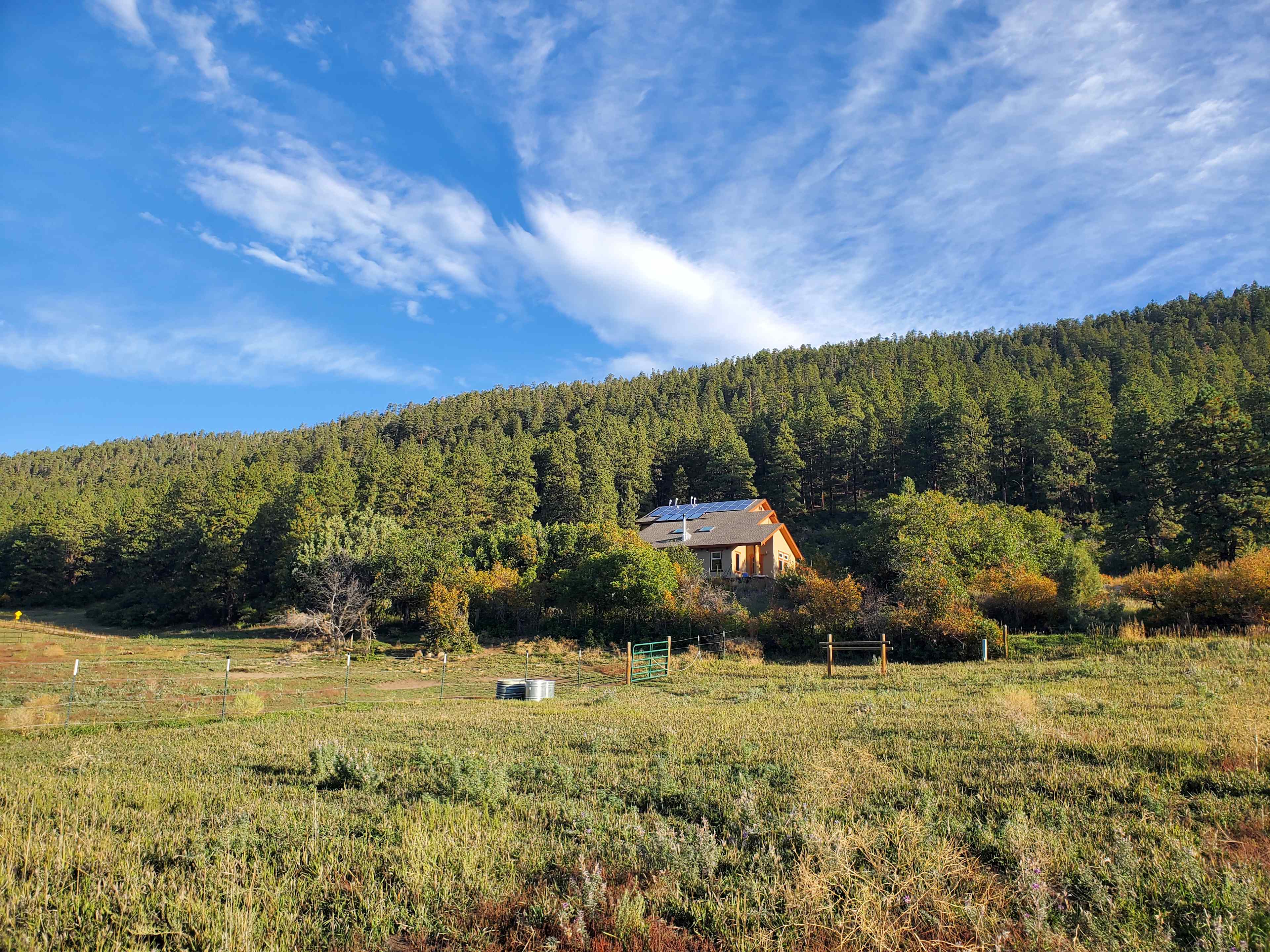 Private residence view from the donkey pasture - two campsites are at the right side of photo.
