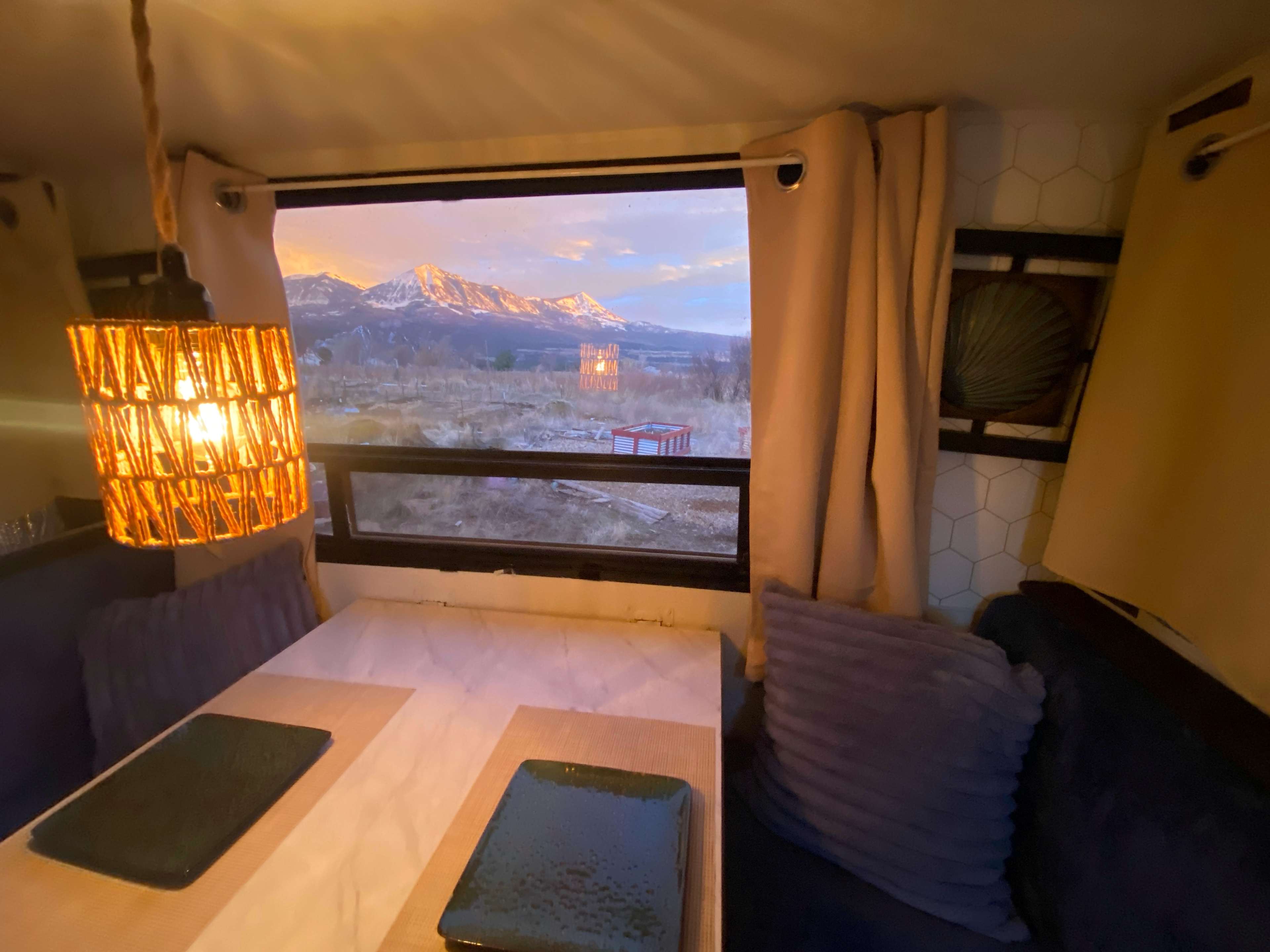 An unmatched dining view, over gardens and vineyards to the beautiful West Elk Mountains. 